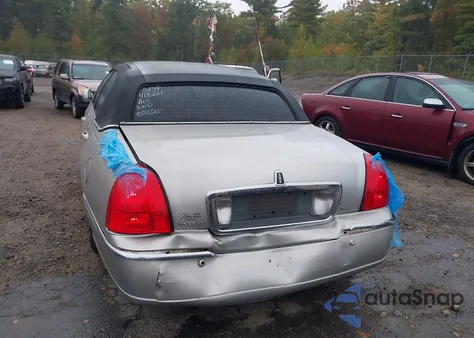 2004 Lincoln Town Car Signature из США, поврежденный, VIN 1LNHM81W34Y603990